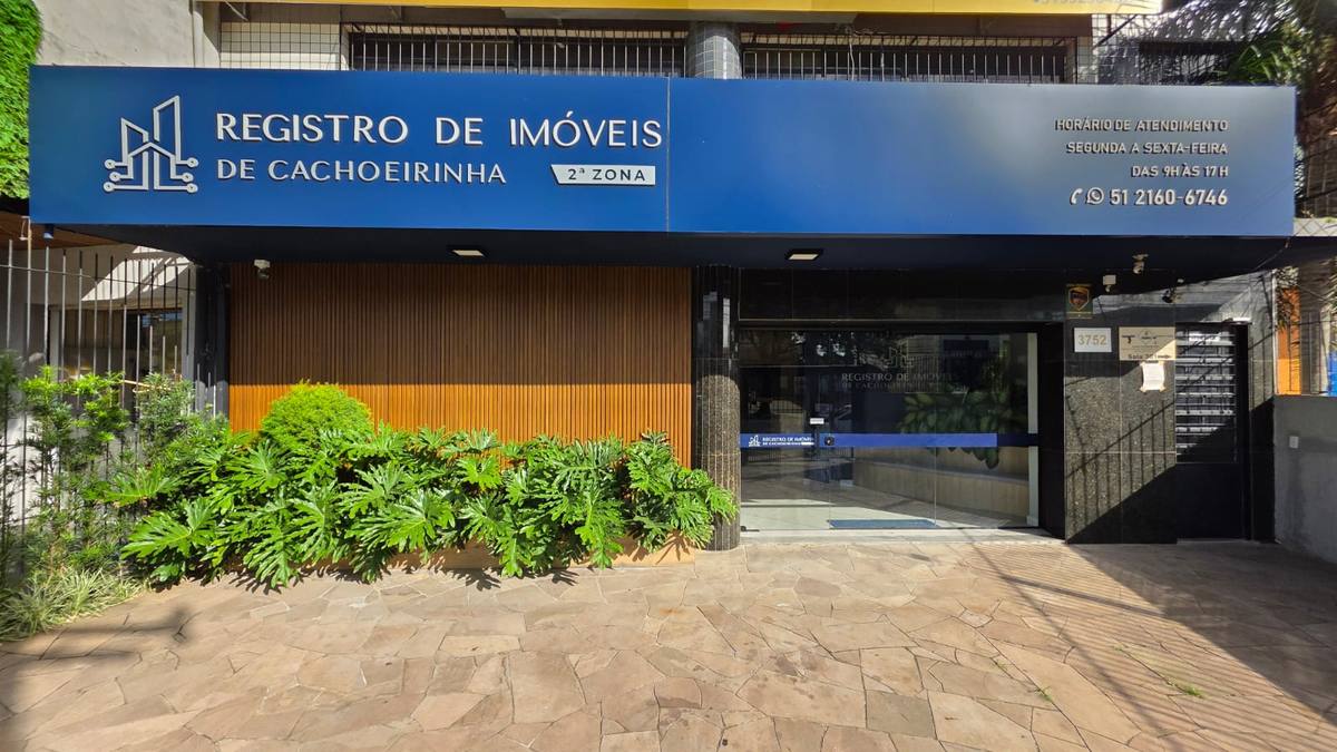 Fachada do cartório na Av. Gen. Flores da Cunha, 3752, com letreiro azul